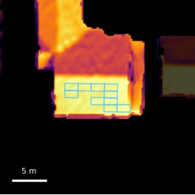 The same roof as measured annual sunlight, with the modelled panel layout outlined.