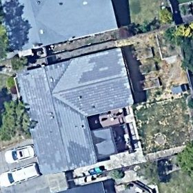 Aerial photograph of a house in Napa, California with an open roof.