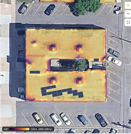Measured annual sunlight on the Denver roof, with the modelled panel layout placed on the brightest areas.